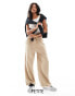 Фото #1 товара Miss Selfridge Petite soft touch pull on wide leg trouser in stone