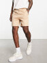 ASOS DESIGN slim shorts in beige quilted texture