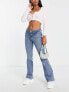 Фото #4 товара New Look Petite low rise flared jean in mid blue
