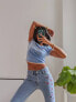 Labelrail x Pose and Repeat mid rise 90s flared jeans with butterfly appliques in blue