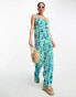 Monki jersey plisse cross back detail jumpsuit in blue and green flower print