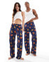 Фото #1 товара ASOS DESIGN Disney lounge bottoms with Lion King print in navy