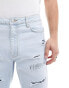 ASOS DESIGN straight leg jeans with rip repair detail in light wash blue