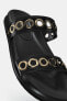 Flat slider sandals with appliqués