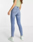 Miss Selfridge Lizzie high waist ripped hem skinny jean in midwash blue