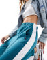 Tommy Jeans co-ord varsity sport track pants in teal