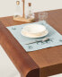 Embroidered linen blend placemat