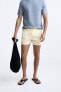 BUTTONED SHORT SWIMMING TRUNKS