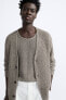 Textured open knit cardigan