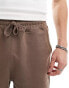 AllSaints Underground sweat shorts in brown exclusive to asos