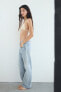 Trf slouchy mid-rise jeans with tab detail