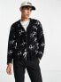 Фото #1 товара HUF cracked cardigan in black with all over print