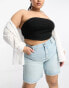 Фото #1 товара ASOS DESIGN Curve denim bermuda shorts with distressed hem in lightwash blue