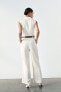 Crepe jumpsuit with belt