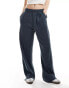 Фото #1 товара ASOS DESIGN waffle wide leg jogger in washed navy