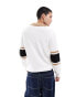 ASOS DESIGN knitted rugby jumper with stripe sleeves in white