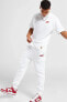Фото #4 товара Брюки спортивные Nike Sportswear Standard Issue Fleece Белые Cargo для мужчин