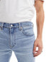 Фото #4 товара Levi's 512 slim taper jeans in light wash blue