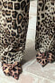 Animal print slingback shoes with bow