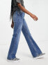 Topshop relaxed flare jeans in mid blue