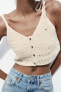 Knit crop top with tied straps