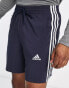 adidas Sportswear essentials 3 stripes shorts in navy and white