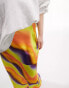 ASOS DESIGN Curve satin bias midi skirt in bright tie dye print