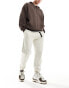 Фото #1 товара ASOS DESIGN oversized joggers with cargo pocket and woven belt detail in beige