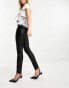 In The Style exclusive coated high waisted skinny jeans in black