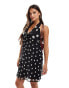 Фото #1 товара ASOS DESIGN chiffon halter mini dress with corsage detail in mixed spot print