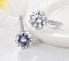 Glittering earrings with clear crystal