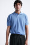 Textured knit polo shirt