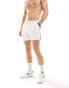 Another Influence swim shorts with taping in white