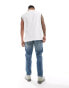 Фото #6 товара ASOS DESIGN stretch tapered jeans in light wash blue