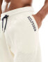 Tommy Hilfiger monotype lounge shorts in beige