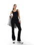 In The Style ribbed scoop neck flared jumpsuit in black