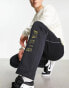 Фото #2 товара Jordan PSG logo joggers in black