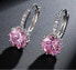 Glittering earrings with pink crystals
