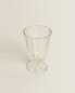 Raised faceted wine glass