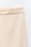 Metallic thread textured trousers