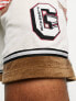 Фото #4 товара ASOS DESIGN oversized shorts in ecru towelling colour block with collegiate badging