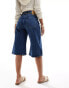 Фото #4 товара Monki Paige low waisted loose denim jorts in mid wash blue