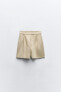 High-waist pleated bermuda shorts