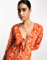 Фото #6 товара Pretty Lavish long sleeve tie midaxi dress in orange zebra