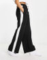 Фото #1 товара ASOS DESIGN pull on trouser with contrast panel in black