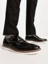 ASOS DESIGN brogue monk shoes in black leather with white wedge sole