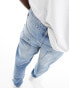 ASOS DESIGN tapered jeans in mid wash blue