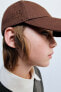 True neutrals embroidered peak cap