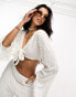 Фото #2 товара ASOS DESIGN premium embellished long sleeve beach crop top in white