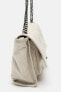 Rocker crossbody bag with a wrinkled effect
